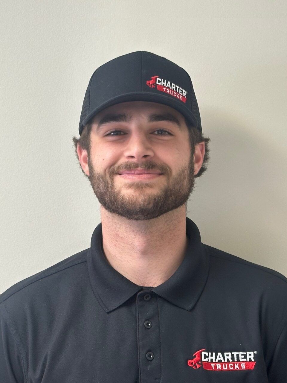 Image of Dom in Sales at Charter Trucks, wearing a Charter Trucks Shirt & hat.